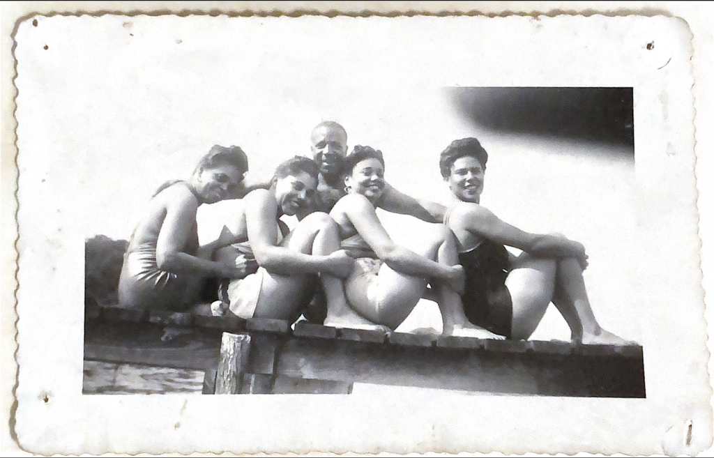 Four women and one man on a pier at Elktonia Beach